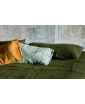 Bed covered with Once Milano bedding in true green featuring 3 pillows in sage green, green and mustard covers