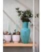 Dark Turquoise Vase by Frantisek Jungvirt and two light pink pots, staged photo