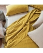 Staged photo featuring Once Milano yellow linen bedding