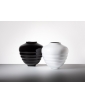 Black and White Coco Vases next to each other.