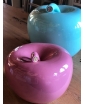 Pink and Blue Apple Money boxes next two each other.