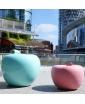 TWO EVA APPLE OF DESIRE - one large apple in glossy aquamarine and a small apple in mat pink finish. Lifestyle photo