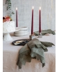 A table setting featuring a mint green Sicily napkin by Once Milano