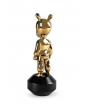 The Guest by Jaime Hayon in Shiny Gold on the Black Base. From the back.