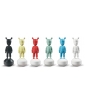 Six The Guest Figurines in various colors.
