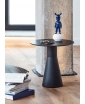 The Guest Figurine in Dark Blue on the side table. Staged photo.
