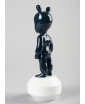 The Guest Figurine in Dark Blue from the back.
