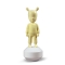 THE LIGHT YELLOW GUEST FIGURINE