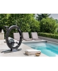 Ciclotte Bike is featured outdoors next to the pool.
