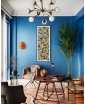 The "Summer" oil painting by Ales Doll on the blue wall. Staged Image.