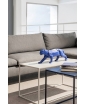 Cobalt Blue Origami Panther placed on a coffee table. stage photo.