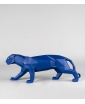 Cobalt Blue Origami Panther placed on a coffee table. stage photo.