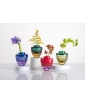 A group of four Toy vessels in various colors.