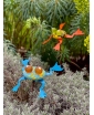 Blue and Orange Hopkins Garden Frog Decor displayed together in a natural setting – a lifestyle image.