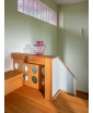 A chic interior featuring the Fuchsia Wavy Glass Vase by Frantisek Jungvirt.
