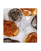 opaque white with gray and amber flowers in transparent glass - swatch