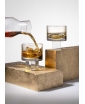 TWO CUBE WHISKY GLASSES IN FINISH. STAGED IMAGE.