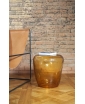 ISOLA GLASS SIDE TABLE IN GOLDEN TOPAZ. Staged image.