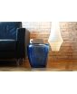 ISOLA GLASS SIDE TABLE IN OCEAN BLUE. Lifestyle Image.
