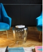 ISOLA GLASS SIDE TABLE IN MISTY SMOKE. Lifestyle photo.