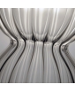 Detail of the Nana clear hand-blown glass carafe, showing curved ribbed surface and light reflections.